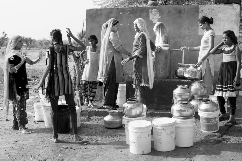 Fighting over water-filling turns at a public standpoint in a village in district Jaipur, Rajasthan